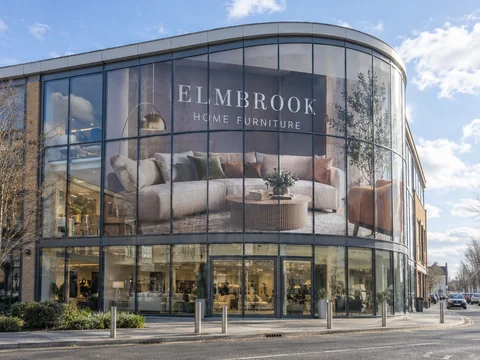 Lion Sign — Large-format digitally printed window vinyl and custom glass façade graphics for furniture retail.