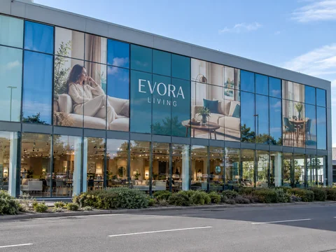 Lion Sign — Large-format digitally printed window vinyl and custom glass façade graphics for home and lifestyle retail.