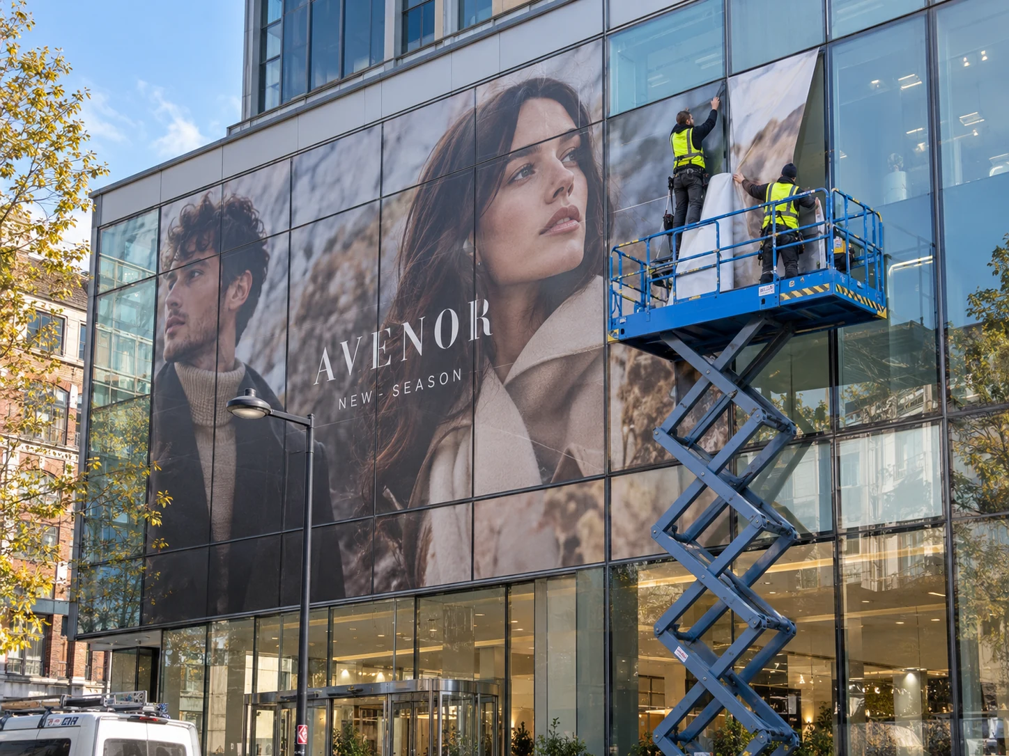 Lion Sign — Large-format digitally printed window vinyl and custom glass façade graphics for commercial façades.